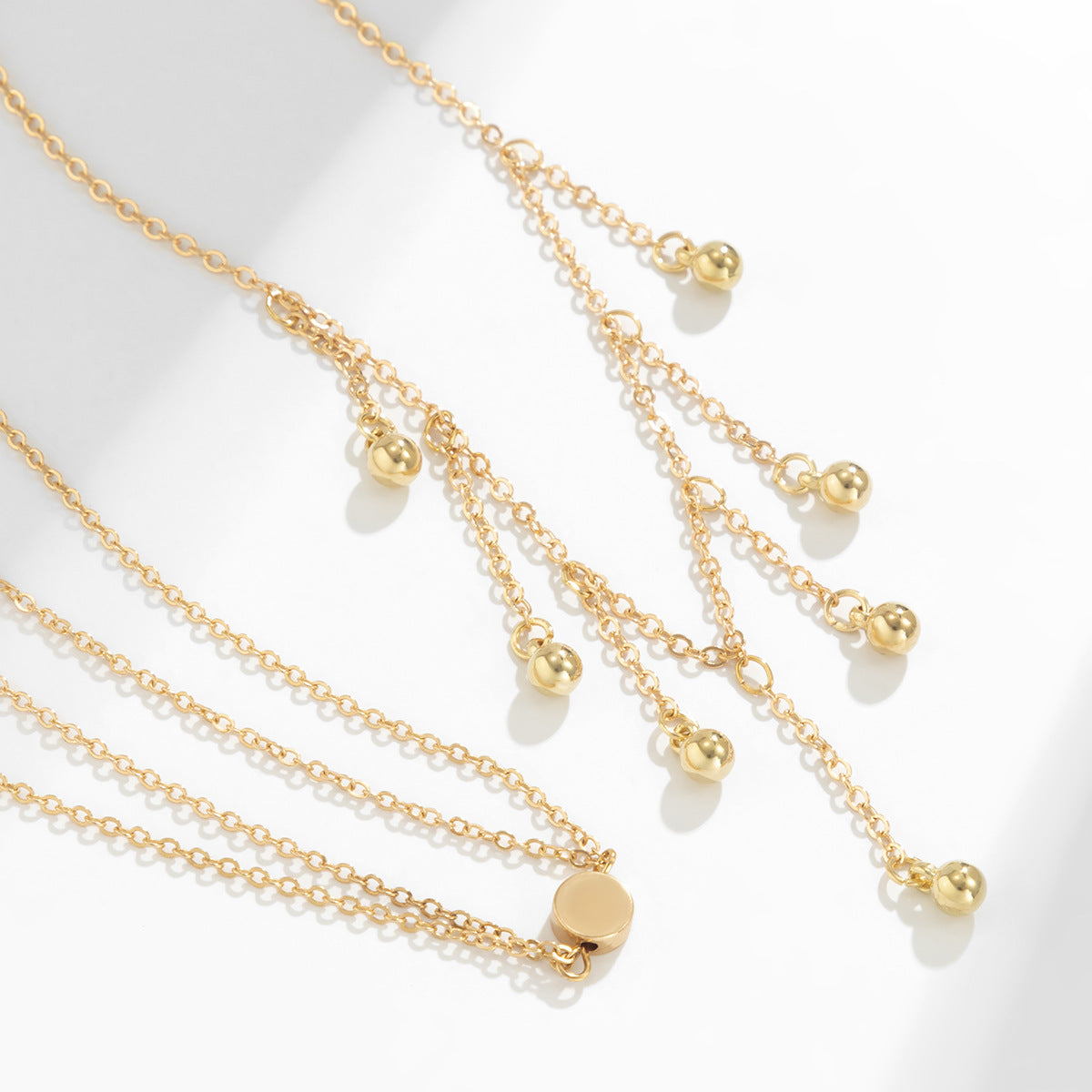 Cross Lob Tassel Suit Anklet
